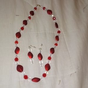 Red and clear necklace and earrings set.